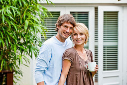 Young couple on a terrace, Hamburg, Germany