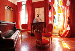 Music room with piano from author Andre Gide from 1900, B and B Chambre Avec Vue, Luberon, France