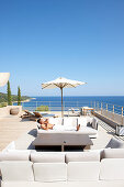 Man sunbathing on a hotel terrace, Ramatuelle, Provence-Alpes-Cote d'Azur, France