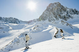 Two skiers, Snow-capped mountains, Tignes, Val d Isere, Savoie department, Rhone-Alpes, France