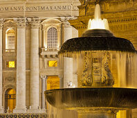 Fountain in front of St. Peter's basilica in the evening light, Basilica Papale di San Pietro in Vaticano, St. Peter's square, Rome, Lazio, Italy