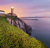 Lighthouse in twilight, Aviles, Bay of Biscay, Asturias, Spain