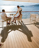 Couple on the terrace of the Eden-Roc Pavillion, Hotel du Cap-Eden-Roc Boulevard JF Kennedy, BP 29, 06601 Antibes Cedex, Cote d'Azur, France, Europe