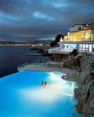 Hotel pavillion and overflow swimming pool at night,  Antibes Cedex, Cote d'Azur, France, Europe