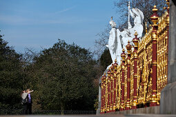 Tourists visiting the Albert Memorial, Hyde Park, London, England, Great Britain