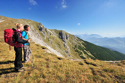Hikers enjoying view, Unnutz, Brandenberg Alps, Tyrol, Austria
