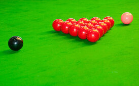 Green baize snooker table, games room. A collection of coloured game balls. Starting position., Snooker Room
