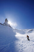 Woman backcountry skiing, ascending towards Kleiner Turm, Drei Tuerme, Raetikon, Montafon, Vorarlberg, Austria