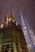 Construction site of Shanghai Tower next to Jin Mao Tower at night, Pudong, Shanghai, China, Asia