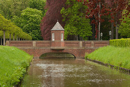 Bridge across the canal, Nordkirchen moated castle, Muensterland, North Rhine-Westphalia, Germany, Europe
