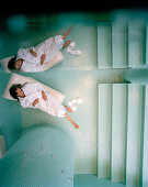 Woman on a lounger in relaxation room of a spa, Langenlois, Lower Austria, Austria