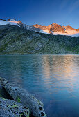 Reichenspitze range reflecting in a mountain lake, Reichenspitze range, Gerlos, Zillertal range, Tyrol, Austria