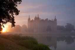 View of Schwerin castle at sunrise, Schwerin, Mecklenburg Western Pomerania, Germany, Europe