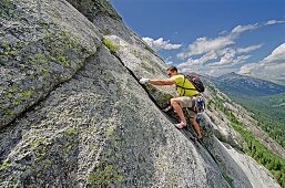 Elijah Weber rock climbing a route called the Regular Route which is rated 5,6 and located on Slick Rock near the city of McCall in the Salmon River Mountains of central Idaho