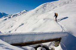 Ski tourer ascending to the Rastkogel, Nurpens Valley, Tux Alps, Tyrol, Austria