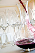 Red wine being poured into a decanter, Red wine glasses, Hamburg, Northern Germany, Germany