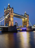 Tower Bridge with lights at night, London, England