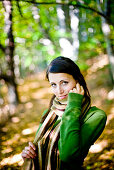 Young woman in autumn forest, Styria, Austria