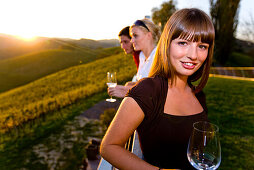 Young people drinking white wine, Gamlitz, Styria, Austria
