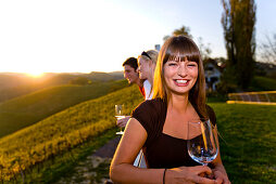 Young people drinking white wine, Gamlitz, Styria, Austria