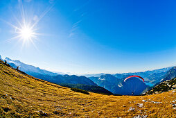 Paraglider on mount Krippenstein, Dachstein mountains, Upper Austria, Austria