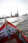 Woman on a boat, Hamburg Harbor, Hamburg, Germany