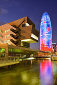 Disseny Hub Barcelona and skyscraper Torre Agbar, illuminated at night, architect Jean Nouvel, Barcelona, Catalonia, Spain