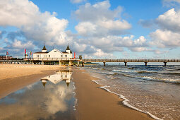 Pier reflecting in the water, Ahlbeck, Usedom island, Baltic Sea, Mecklenburg Western-Pomerania, Germany