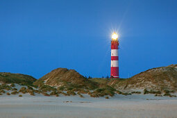 Lighthouse in the dunes along the beach, Kniepsand, Amrum island, North Sea, North Friesland, Schleswig-Holstein, Germany
