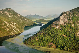 View of the river bend of the Rijeka Crnojevica river, Lake Skadar National Park, Montenegro, Western Balkan, Europe