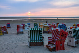 Beach chairs at sunset on the beach, Langeoog Island, North Sea, East Frisian Islands, East Frisia, Lower Saxony, Germany, Europe
