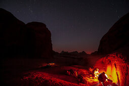 Night camp with campfire, Wadi Rum, Jordan, Middle East