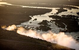 Aerial view of Victoria Falls and Zambezi River at Sunset
