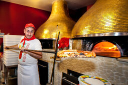 Man making pizza, Naples, Bay of Naples, Campania, Italy