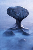 Kannesteinen, mushroom shaped rock formation in Oppedal, Vagsoy Island, Province of Sogn og Fjordane, Vestlandet, Norway, Europe