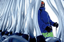 Freeskier at a ski lift, Chandolin, Canton of Valais, Switzerland