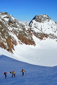 Three back-country skier ascending to Agglsspitze, Pflersch Valley, Stubai Alps, South Tyrol, Italy