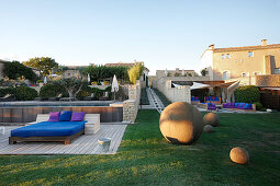 Lounge terrace with sun beds at a hotel pool, Saint-Saturnin-les-Apt, Provence, France