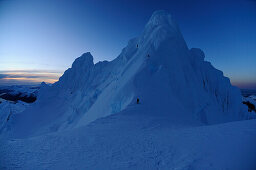 Two mountaineers below summit of Monte Sarmiento, Cordillera Darwin, Tierra del Fuego, Chile