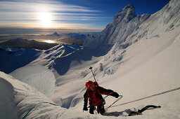 Mountaineer in the north face of Monte Sarmiento, Cordillera Darwin, Tierra del Fuego, Chile