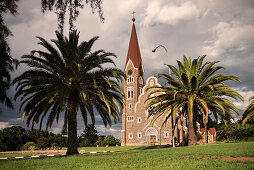 Christ Church with palm trees after a thunderstorm, Windhoek, Namibia, Africa