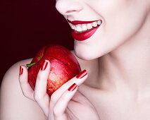 Woman holding apple