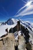 Climber on the Cosmique Ridge at Aiguille du Midi, Mont Blanc, France