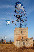 Wind wheel on windmill with blue and white rotor blades, Santanyi, Mallorca, Balearic Islands, Spain, Europe