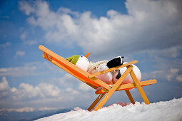 Snowman in a deckchair, Styria, Austria