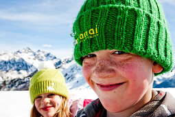 Boy smiling at camera, Planai, Schladming, Styria, Austria