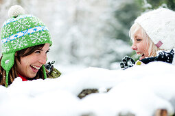 Two young women laughing