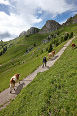 Hiker ascending mount Rotwand, Bavaria, Germany