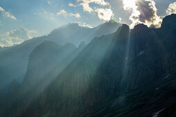 Beams of light over pinnacles, Sentiero Roma, Bergell range, Lombardy, Italy