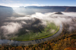 Clearing mist in the valley of the Danube river, Upper Danube Nature Park, Baden-Wuerttemberg, Germany